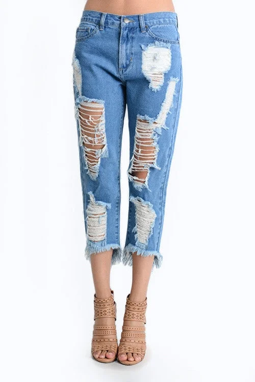 Fashion pieces that complement every woman’s style   Torn Low-Rise Boyfriend Jeans